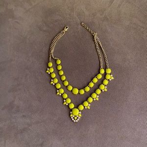 Double strand statement costume necklace with faux rhinestones.